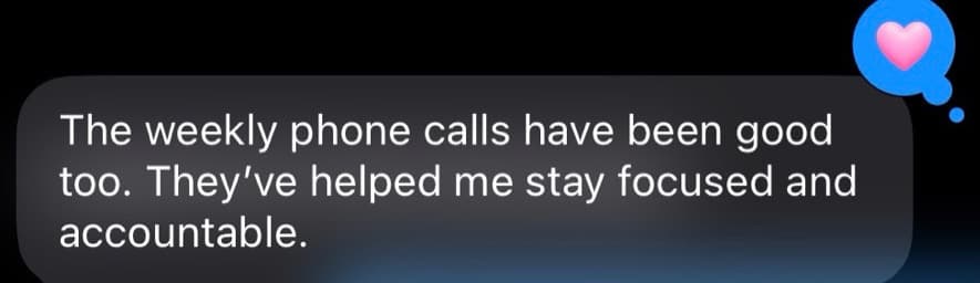 A text message from one of Nickoy's clients that reads, The weekly phone calls have been good too. They've helped me stay focused and accountable.